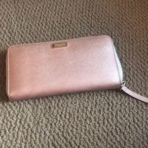Kate Spade Rose Gold zip around wallet